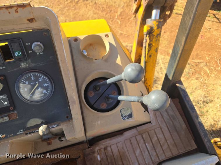 image for item ET1159 1991 John Deere 310D backhoe