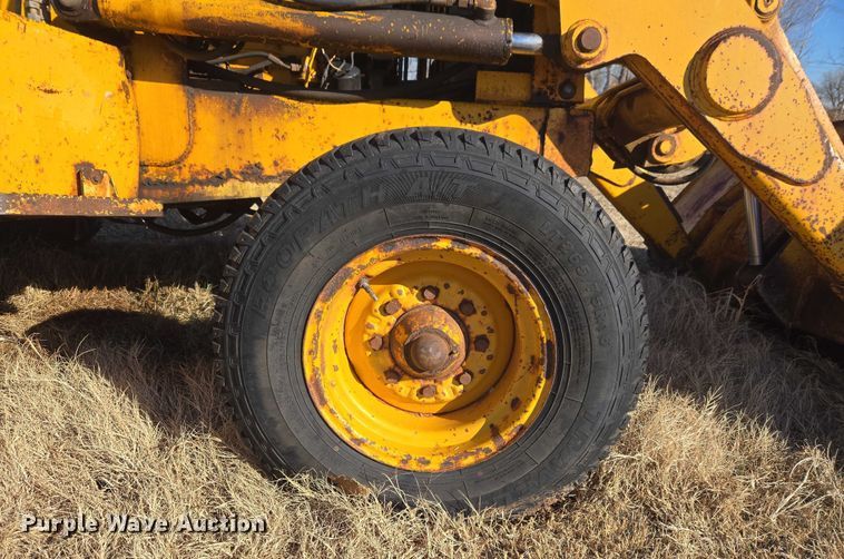 image for item ET1159 1991 John Deere 310D backhoe