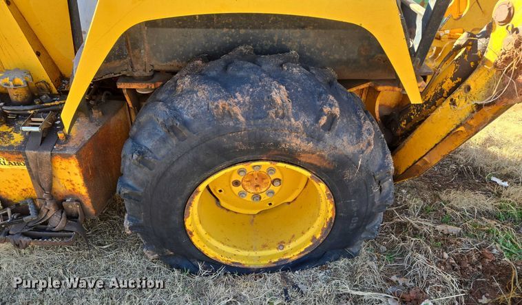 image for item ET1159 1991 John Deere 310D backhoe