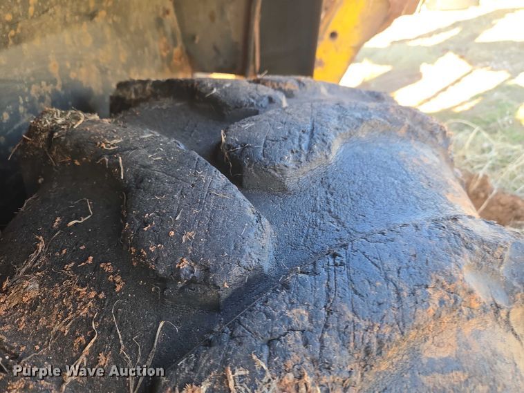 image for item ET1159 1991 John Deere 310D backhoe