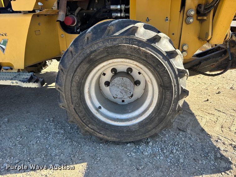 image for item FB0538 2012 Vermeer RTX550 trencher with equipment trailer