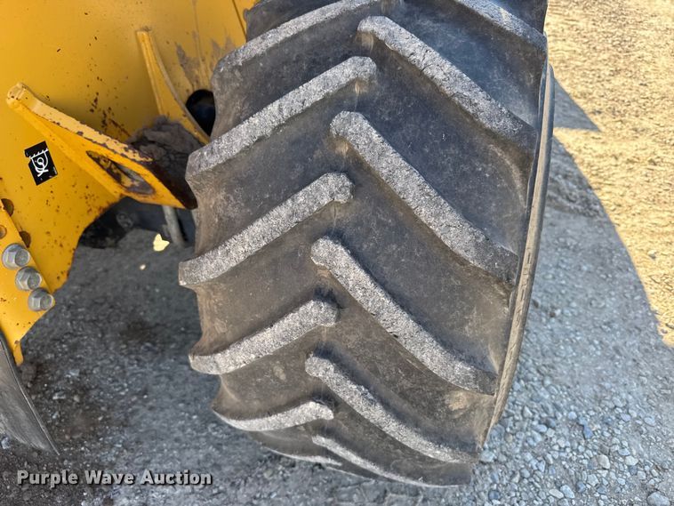 image for item FB0538 2012 Vermeer RTX550 trencher with equipment trailer