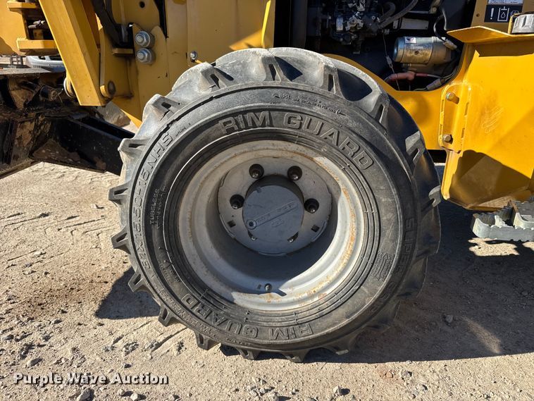 image for item FB0538 2012 Vermeer RTX550 trencher with equipment trailer