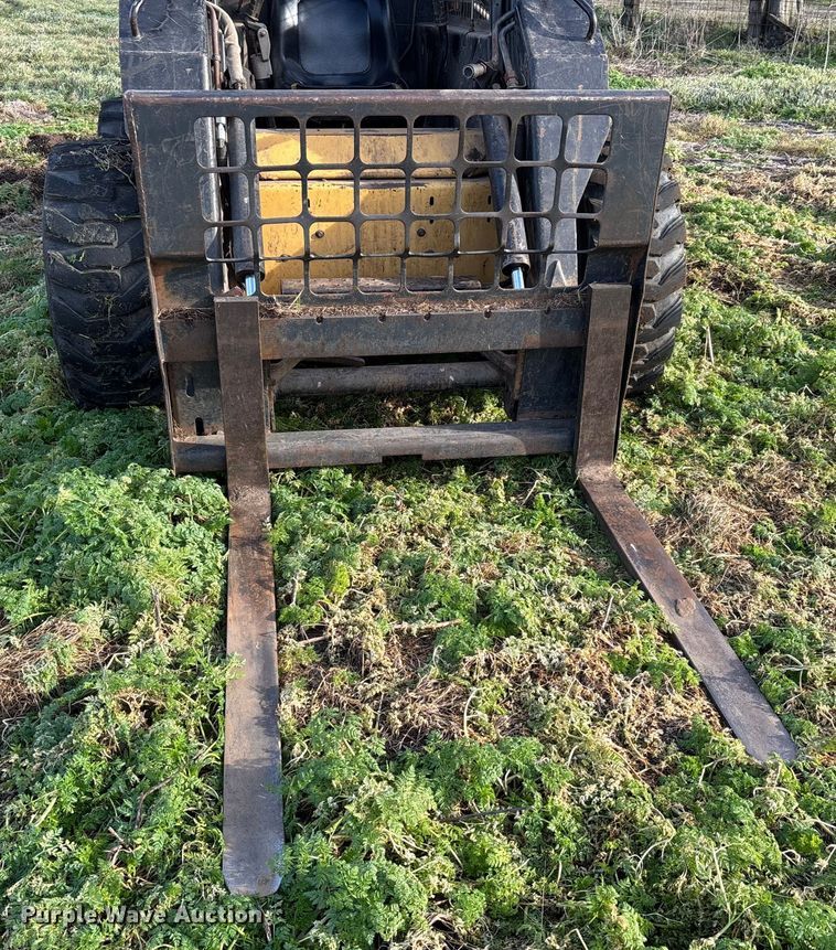 image for item DW7394 1997 New Holland L865 Turbo skid steer loader