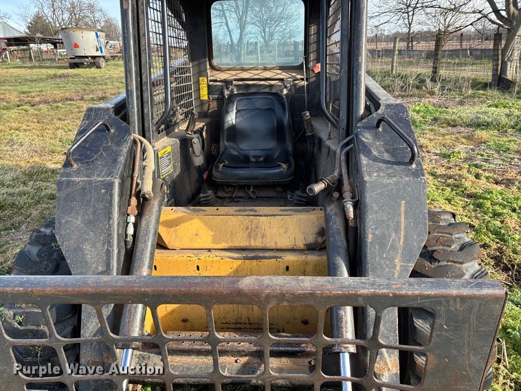 image for item DW7394 1997 New Holland L865 Turbo skid steer loader