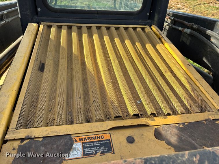 image for item DW7394 1997 New Holland L865 Turbo skid steer loader