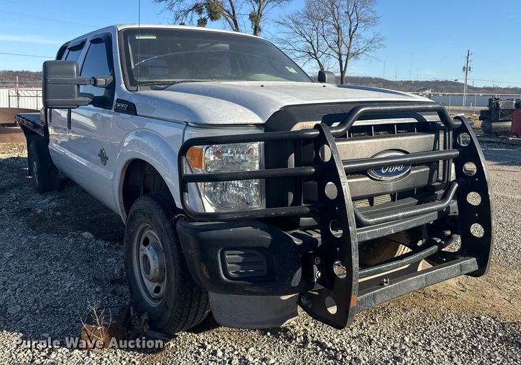 image for item DQ4218 2011 Ford F350 Super Duty Crew Cab flatbed pickup truck