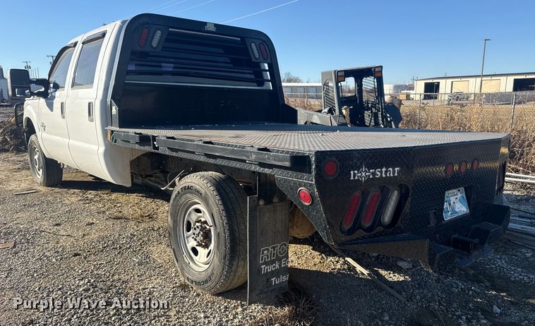 image for item DQ4218 2011 Ford F350 Super Duty Crew Cab flatbed pickup truck