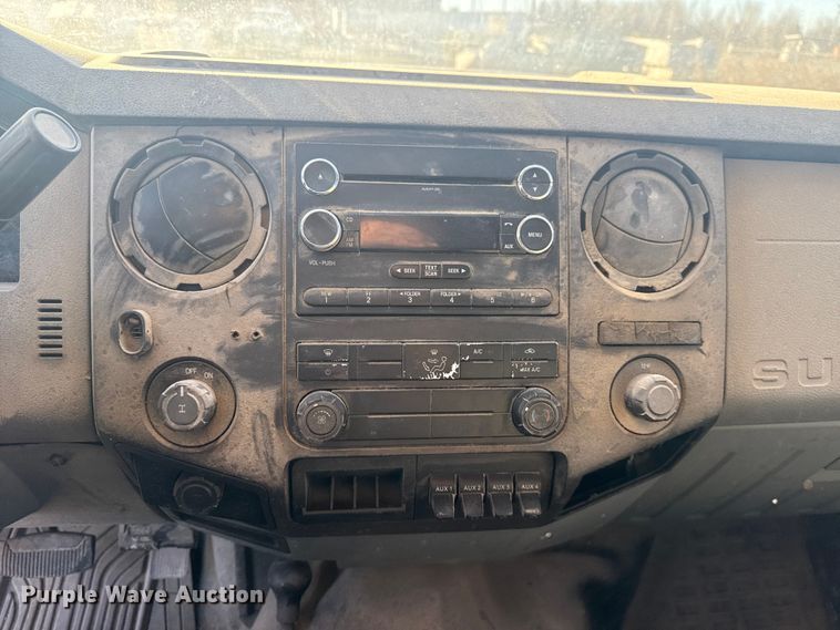 image for item DQ4218 2011 Ford F350 Super Duty Crew Cab flatbed pickup truck