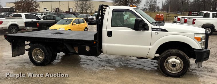 image for item EN0843 2015 Ford F350 Super Duty flatbed pickup truck