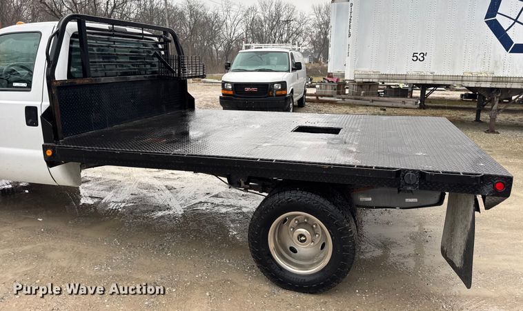 image for item EN0843 2015 Ford F350 Super Duty flatbed pickup truck