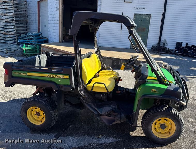 image for item EN0869 2014 John Deere 825I utility vehicle