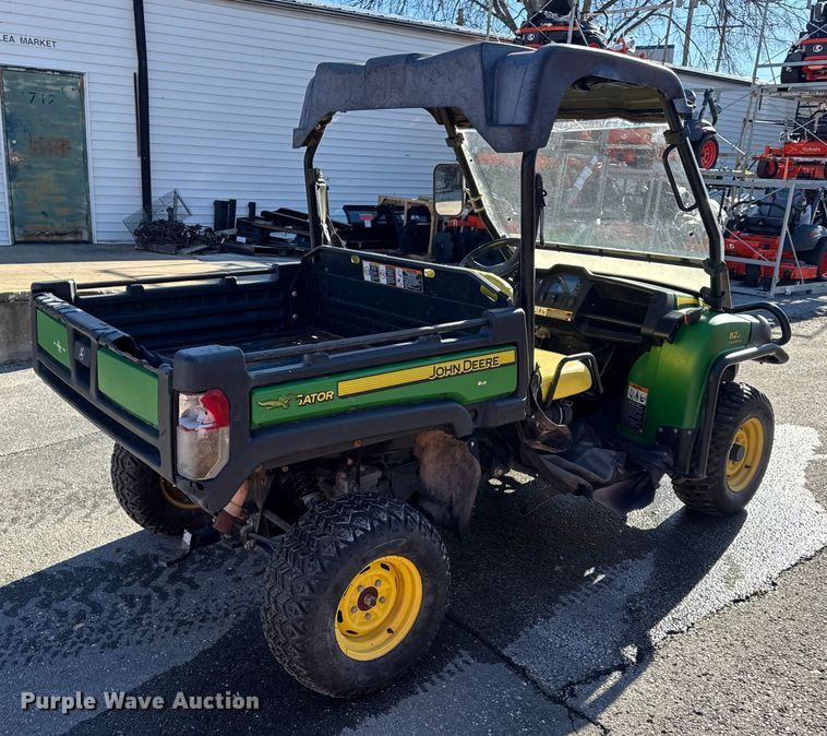 image for item EN0869 2014 John Deere 825I utility vehicle