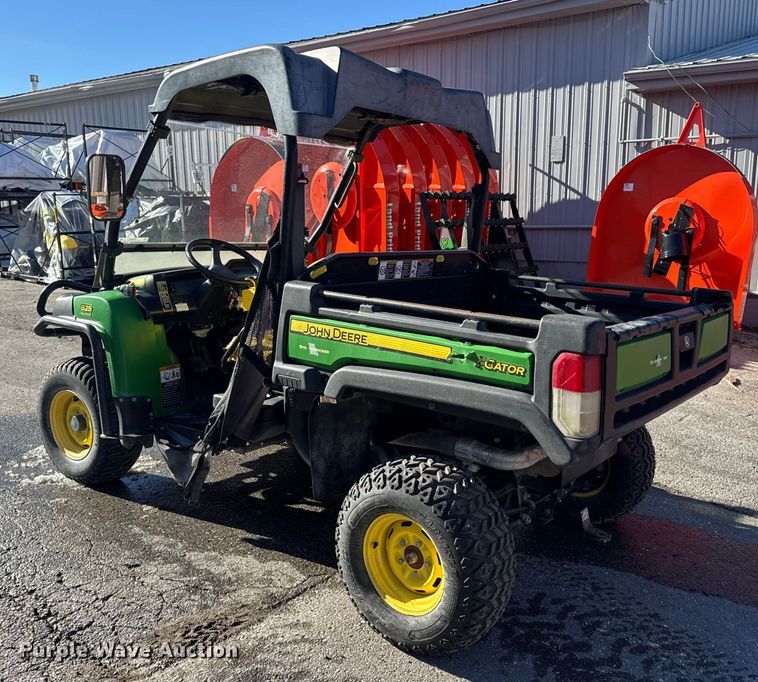 image for item EN0869 2014 John Deere 825I utility vehicle