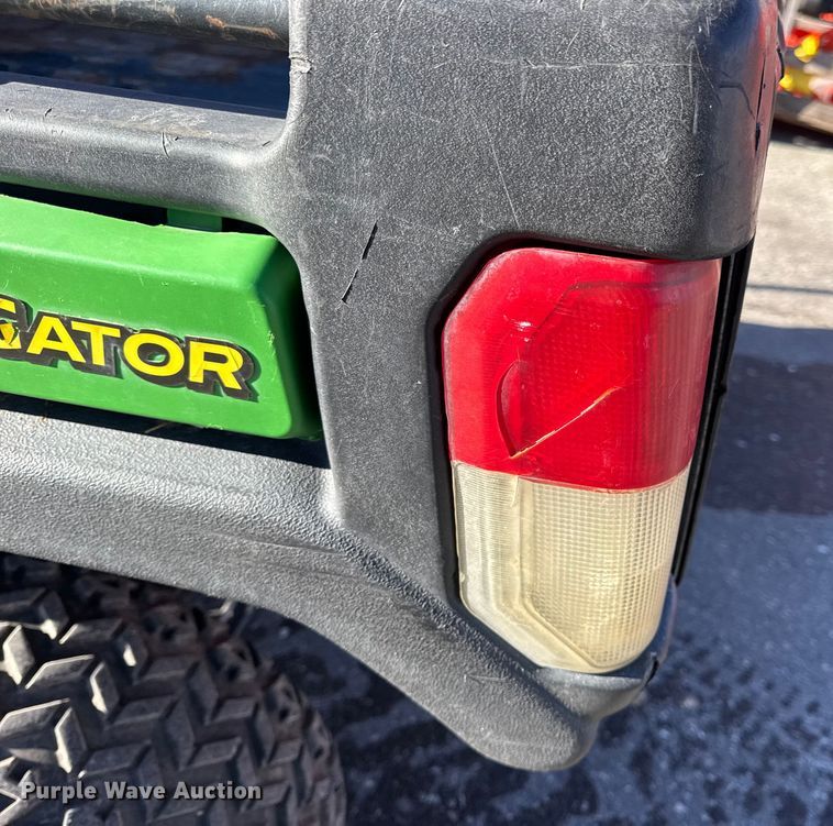 image for item EN0869 2014 John Deere 825I utility vehicle