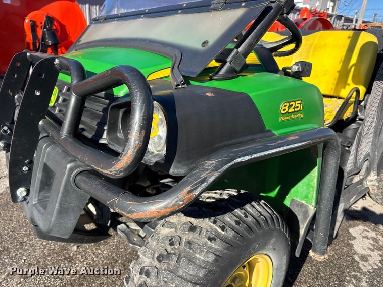 image for item EN0869 2014 John Deere 825I utility vehicle