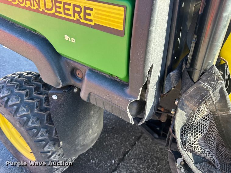 image for item EN0869 2014 John Deere 825I utility vehicle