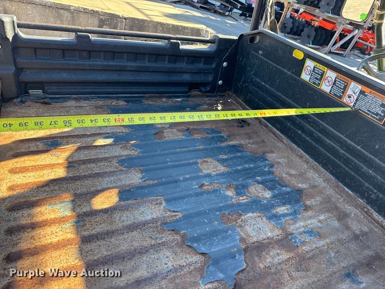 image for item EN0869 2014 John Deere 825I utility vehicle