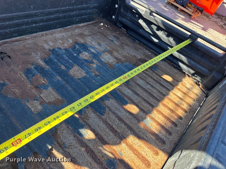 image for item EN0869 2014 John Deere 825I utility vehicle