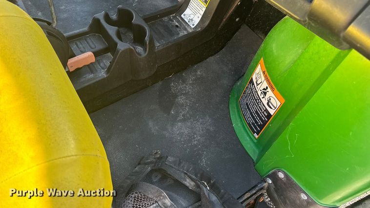 image for item EN0869 2014 John Deere 825I utility vehicle