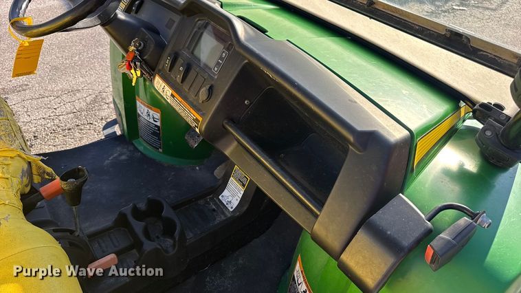 image for item EN0869 2014 John Deere 825I utility vehicle