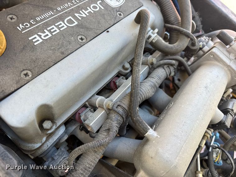 image for item EN0869 2014 John Deere 825I utility vehicle