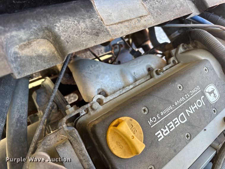 image for item EN0869 2014 John Deere 825I utility vehicle