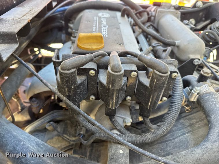 image for item EN0869 2014 John Deere 825I utility vehicle