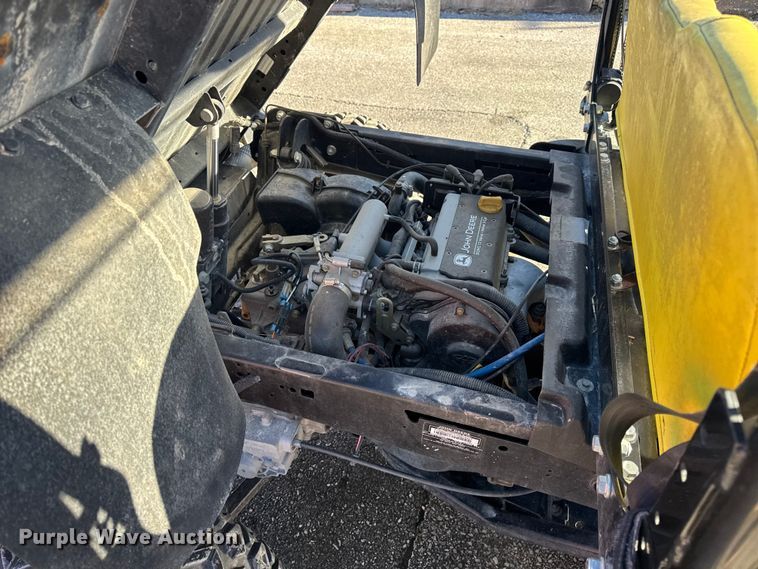 image for item EN0869 2014 John Deere 825I utility vehicle