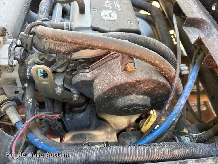 image for item EN0869 2014 John Deere 825I utility vehicle