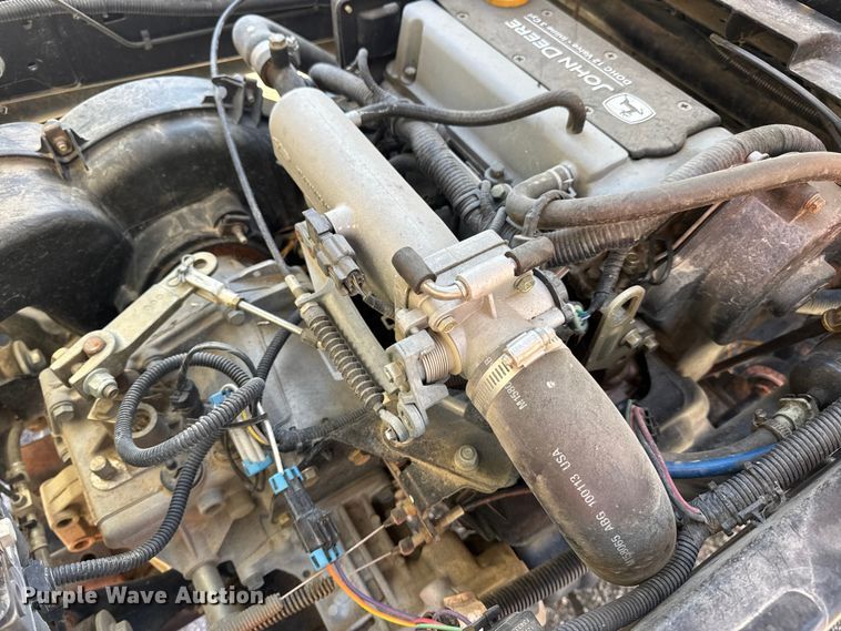 image for item EN0869 2014 John Deere 825I utility vehicle