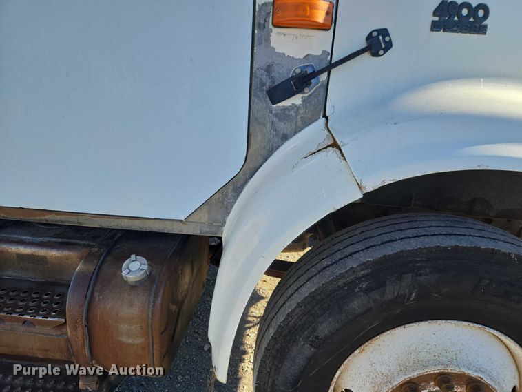 image for item ET1165 1999 International 4900 refuse truck