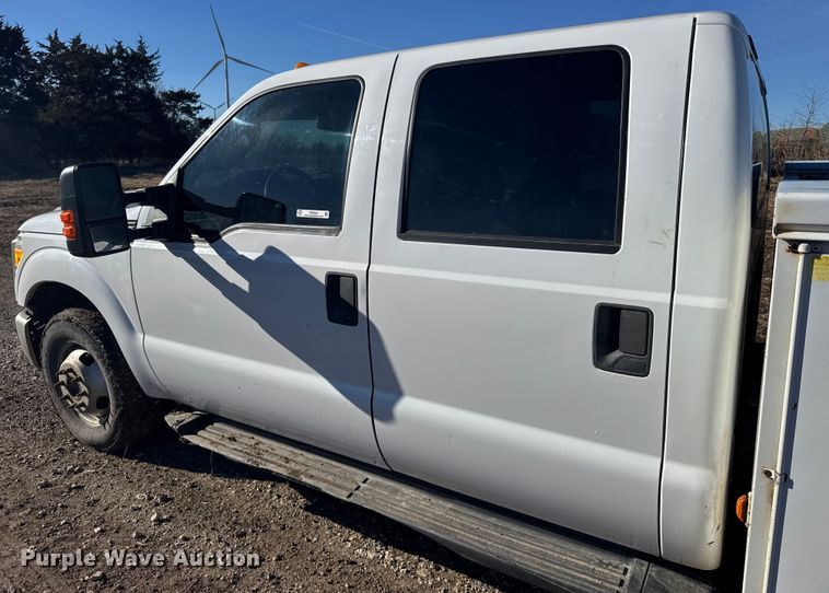 image for item FB0563 2016 Ford F350 Super Duty XL Crew Cab utility bed pickup truck