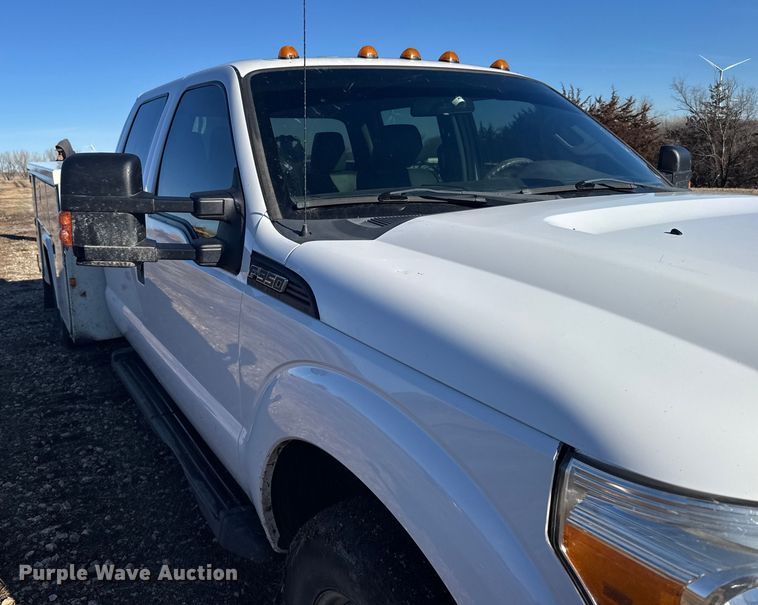 image for item FB0563 2016 Ford F350 Super Duty XL Crew Cab utility bed pickup truck