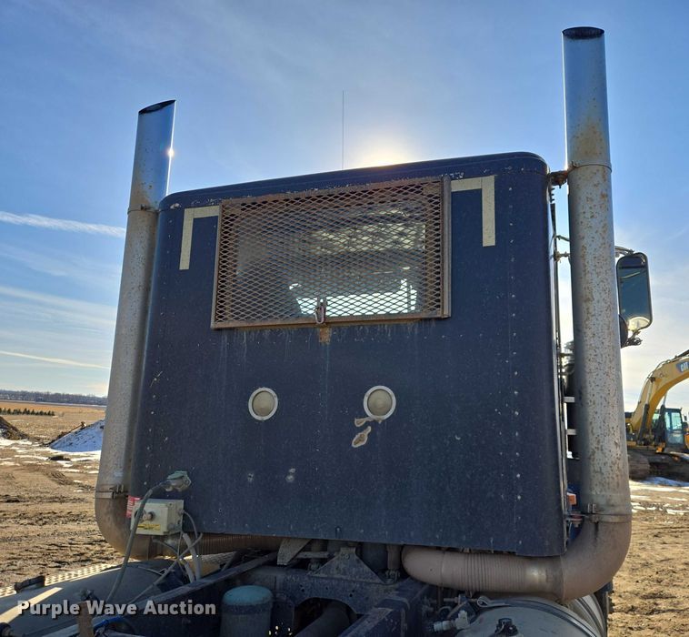 image for item EB1228 1999 International 9900 semi truck