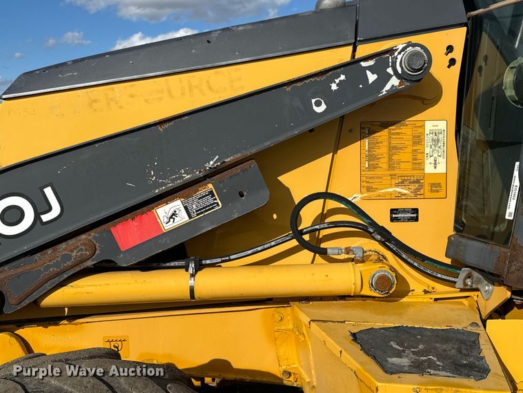 image for item EG1952 John Deere 310J backhoe