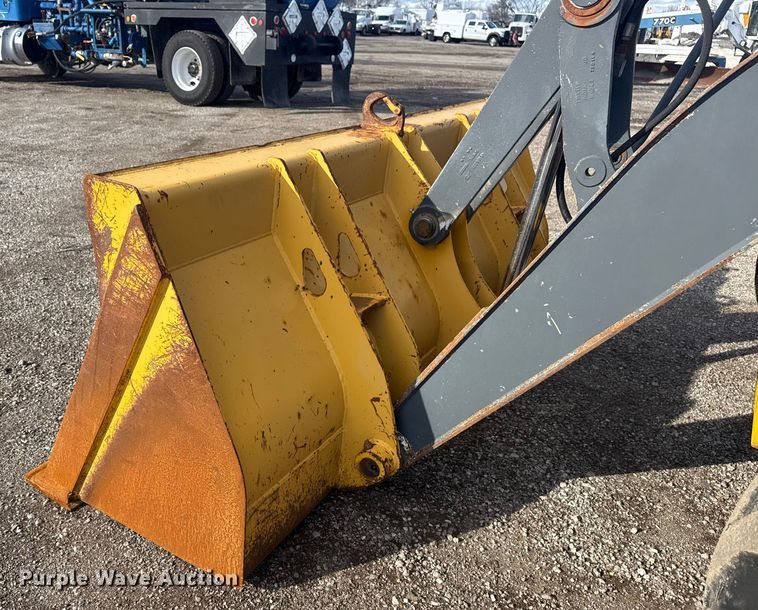 image for item EG1952 John Deere 310J backhoe