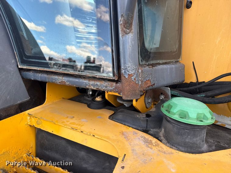 image for item EG1952 John Deere 310J backhoe