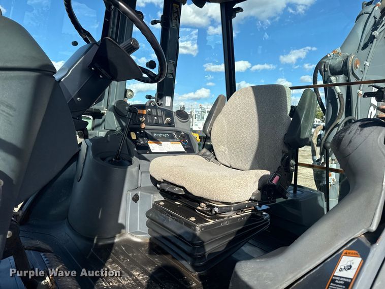 image for item EG1952 John Deere 310J backhoe