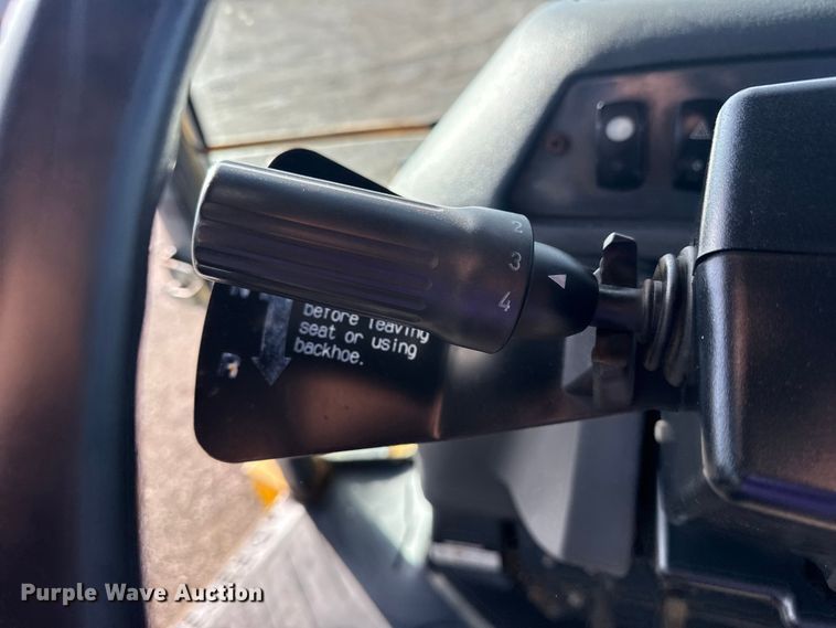 image for item EG1952 John Deere 310J backhoe