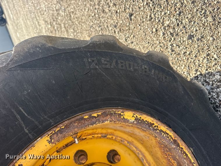 image for item EG1952 John Deere 310J backhoe