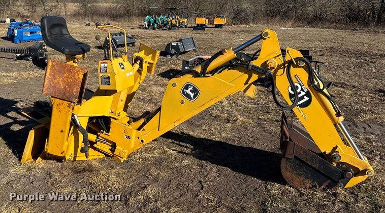 image for item EN0221 John Deere 911 extender skid steer backhoe