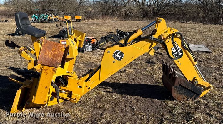image for item EN0221 John Deere 911 extender skid steer backhoe