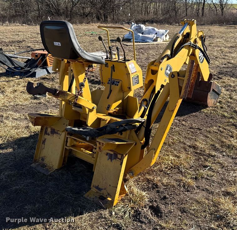 image for item EN0221 John Deere 911 extender skid steer backhoe