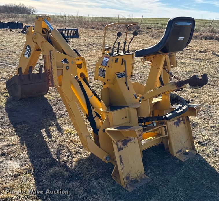 image for item EN0221 John Deere 911 extender skid steer backhoe
