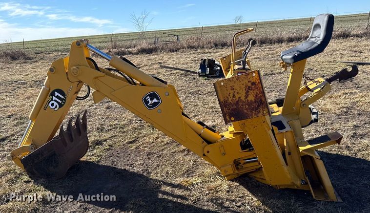 image for item EN0221 John Deere 911 extender skid steer backhoe