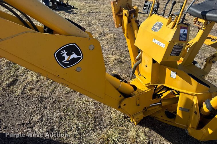 image for item EN0221 John Deere 911 extender skid steer backhoe