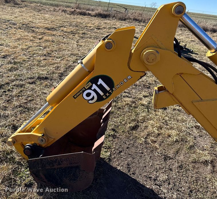 image for item EN0221 John Deere 911 extender skid steer backhoe