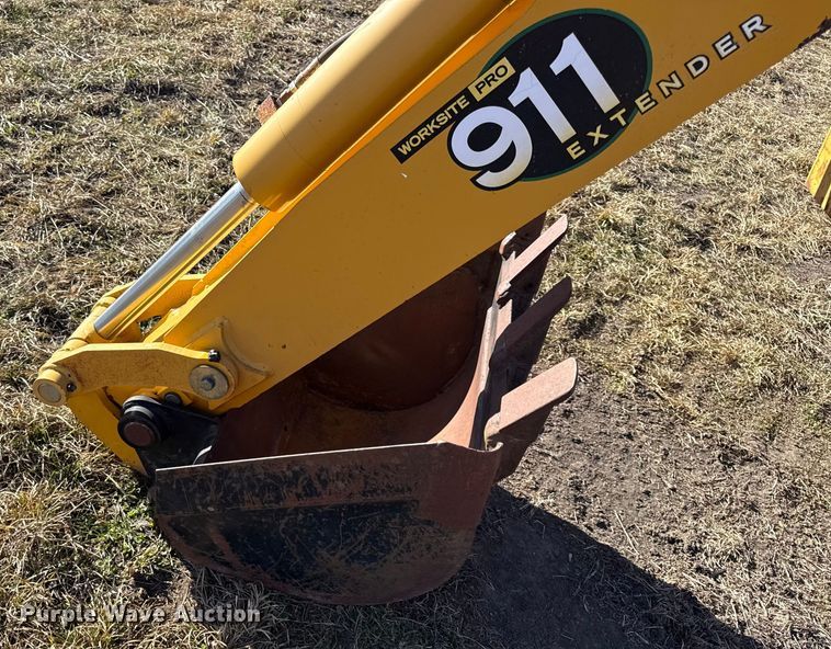 image for item EN0221 John Deere 911 extender skid steer backhoe