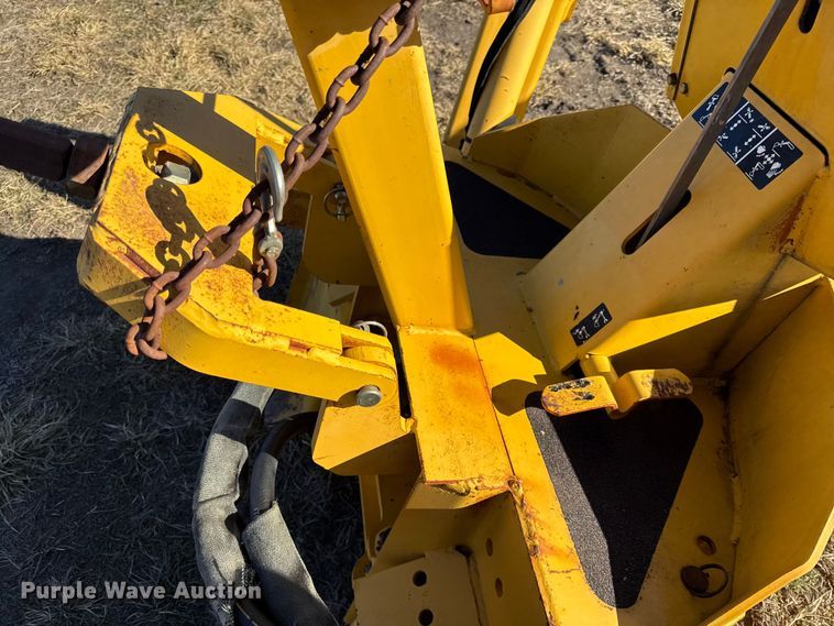 image for item EN0221 John Deere 911 extender skid steer backhoe